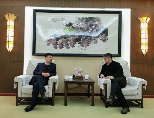1576573759332058733.jpg 1 校长李林会见林洪亮.jpg